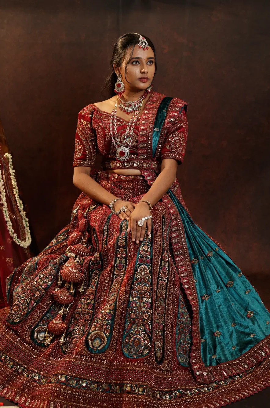 Glamorous lehenga design with pearl embellishments and flared hemline.